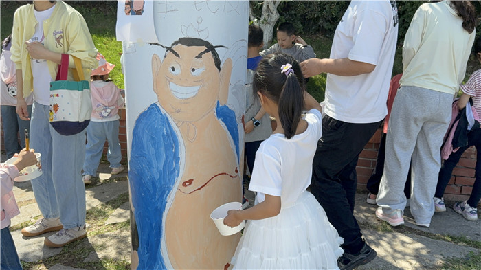 当阳：漫画当阳情 童心传信义(图2)